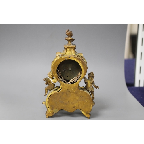 179 - A late 19th century Austrian ormolu and enamel miniature timepiece, height 14cm Condition: Gilding w... 