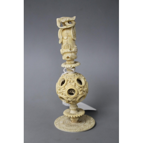 181 - A Chinese concentric ball on stand, height 15cm Condition: Slightly tilting to one side with a crack... 