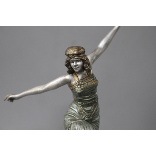 183 - An Art Deco silvered bronze figure of a dancing girl, Paul Phillipe, on signed onyx plinth, height 2... 