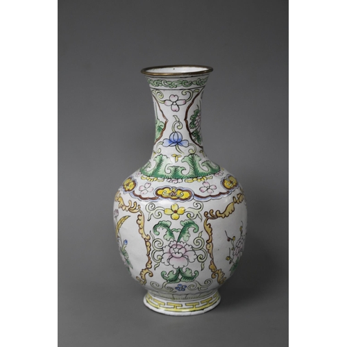 186 - A Chinese enamelled brass vase, decorated with flowers, height 15.5cm Condition: Good condition... 