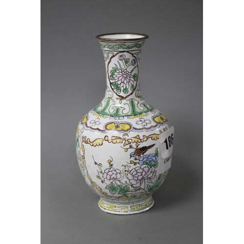 186 - A Chinese enamelled brass vase, decorated with flowers, height 15.5cm Condition: Good condition... 