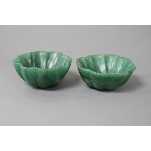 191 - A pair of Mughal style green aventurine quartz petal lobed bowls, both with natural inclusions to th... 