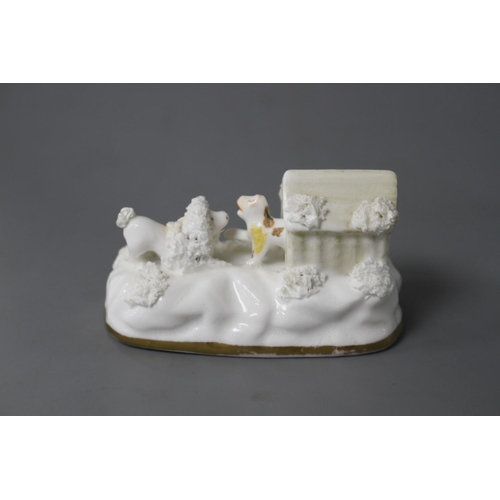 193 - A rare Staffordshire porcelain toy group of a cat, poodle and kennel, c.1835-50, possibly LLoyd Shel... 