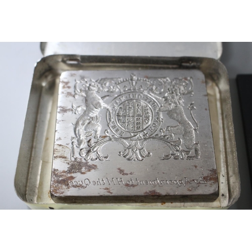 201 - A cut steel seal matrix with the Royal Coat of Arms and engraved by appointment to HM The Queen, 6.5... 