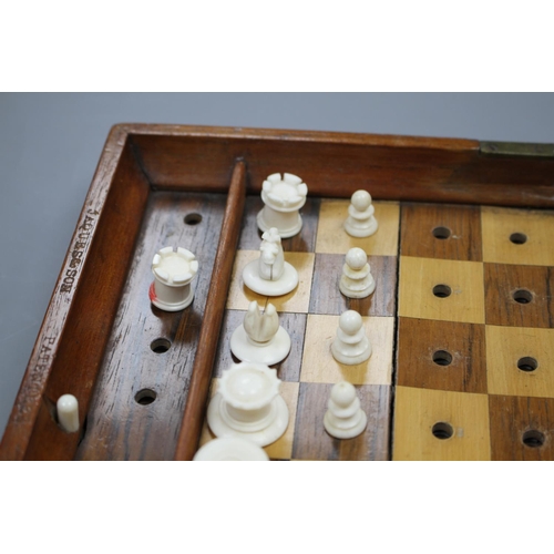 208 - A late 19th century Jaques , London Travelling 'In Statu Quo' travelling chess set, the folding maho... 