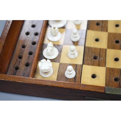 208 - A late 19th century Jaques , London Travelling 'In Statu Quo' travelling chess set, the folding maho... 