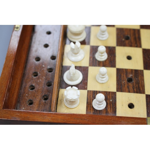 209 - A late 19th century Jaques, London Travelling 'In Statu Quo' travelling chess set, the folding fiddl... 