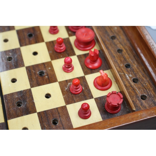 209 - A late 19th century Jaques, London Travelling 'In Statu Quo' travelling chess set, the folding fiddl... 