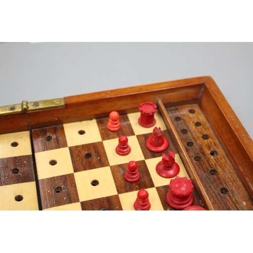 209 - A late 19th century Jaques, London Travelling 'In Statu Quo' travelling chess set, the folding fiddl... 