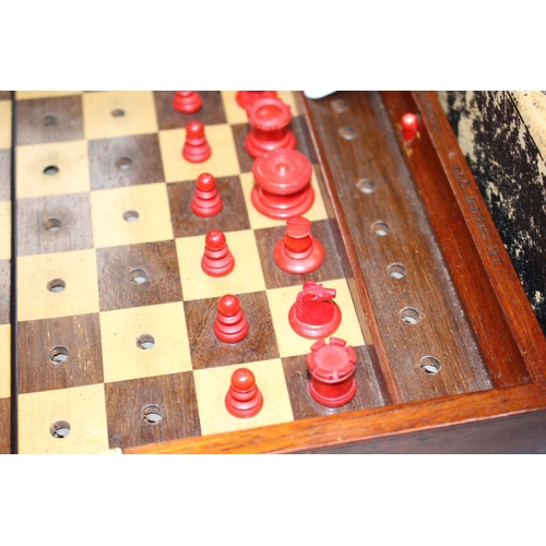 212 - A late 19th century Jaques, London Travelling 'In Statu Quo' travelling chess set, the original leat... 