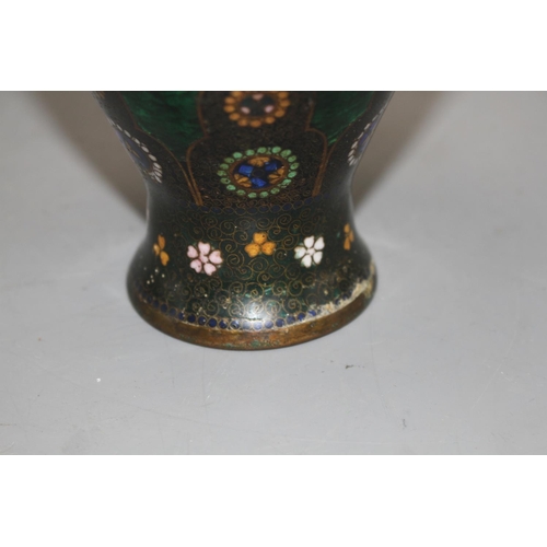 24 - A Japanese cloisonne vase, with mons decoration, 27cm Condition: One distinct bruise going down to t... 