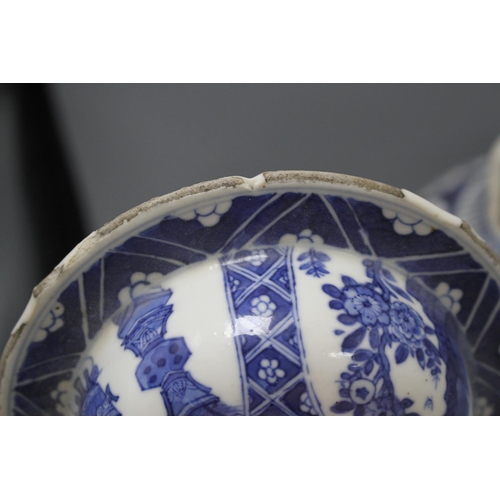 26 - A 19th century Chinese blue and white jar, with panelled decoration, height 28cm and an associated v... 