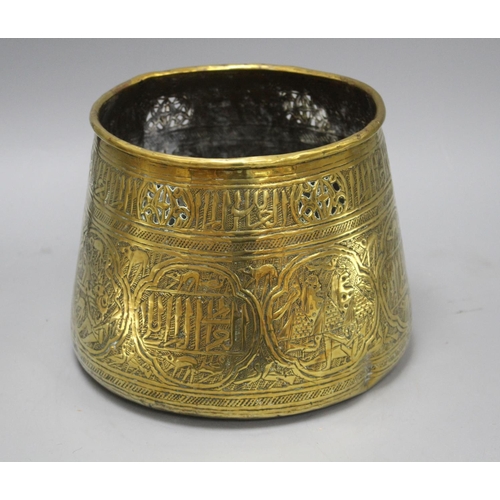 27 - A Cairoware brass jardiniere, decorated with panels of figures and calligraphy, height 18cm, diamete... 