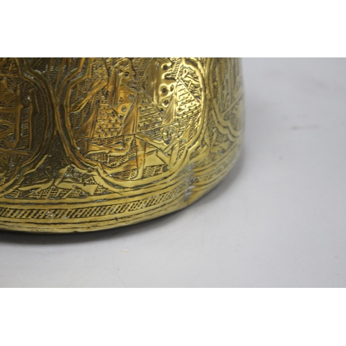 27 - A Cairoware brass jardiniere, decorated with panels of figures and calligraphy, height 18cm, diamete... 