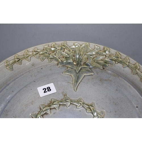 28 - A Studio pottery tray, decorated with ivy leaves, seal mark to rim JC, diameter 35cm Condition: A li... 