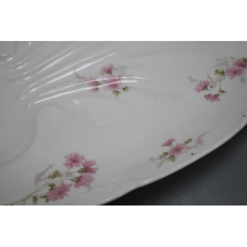 38 - A CFH/GDM Limoges porcelain meat plate, 51cm Condition: Wear to the gilding and some wear to the ste... 