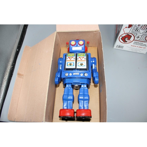 39 - Four collectors' robots, various, including a Rocket Toys R-1, two battery-operated ME 100 Space Wal... 