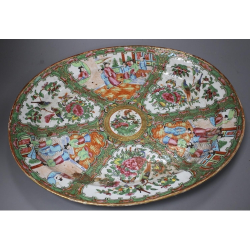 50 - A 19th century Cantonese porcelain oval dish, decorated with panels of figures and birds, 42 x 34cm,... 