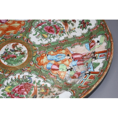 50 - A 19th century Cantonese porcelain oval dish, decorated with panels of figures and birds, 42 x 34cm,... 