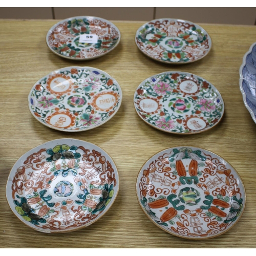 59 - A near set of six 19th century Chinese famille rose saucer dishes, each painted with fruit and shou ... 