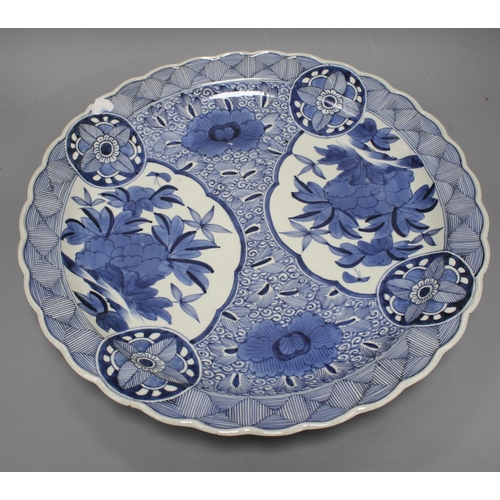 60 - An Arita blue and white charger, 44.5cm Condition: Chip to rim