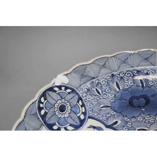 60 - An Arita blue and white charger, 44.5cm Condition: Chip to rim