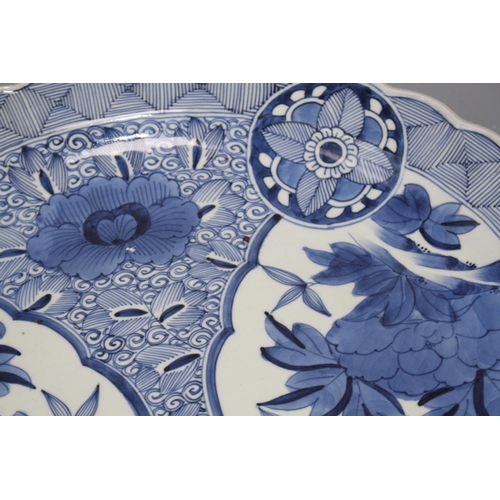 60 - An Arita blue and white charger, 44.5cm Condition: Chip to rim