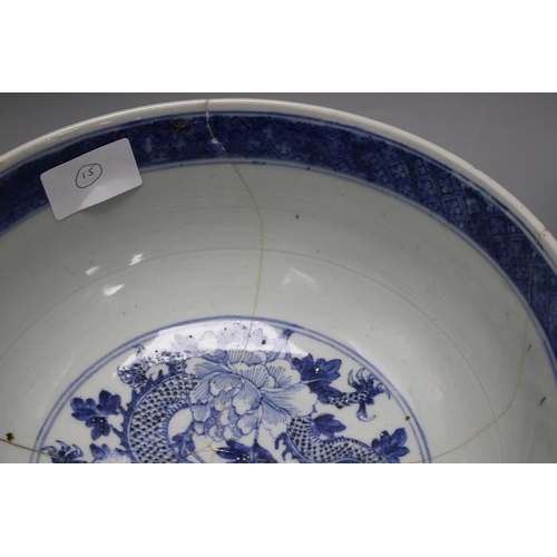 62 - A large Chinese blue and white bowl, 29.5cm a prunus jar, height 12cm and a Kangxi blue and white fl... 