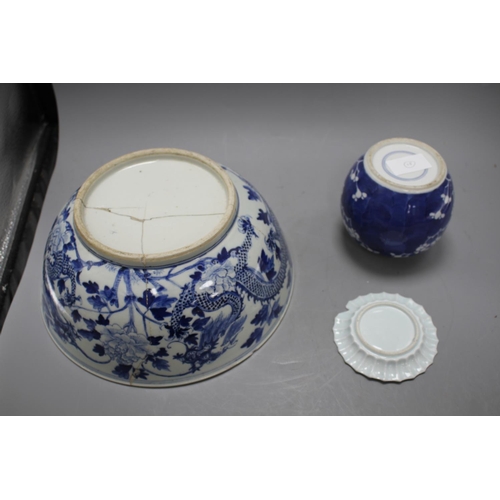 62 - A large Chinese blue and white bowl, 29.5cm a prunus jar, height 12cm and a Kangxi blue and white fl... 