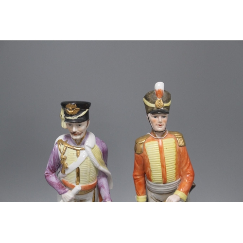 71 - Two porcelain figures of Napoleonic soldiers, 32 and 34cm Condition: In good condition,... 