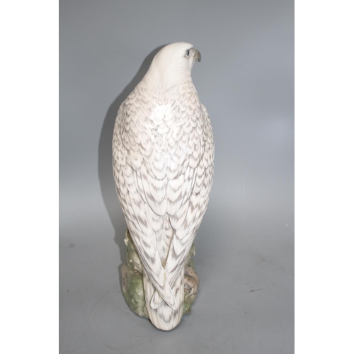 74 - A Royal Copenhagen Icelandic falcon, model 1661, H. 39cm Condition: Tail feather broken and re-glued... 