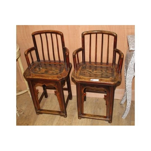 867 - A pair of Chinese elm wood chairs, W.44cm D.33cm H.68cm Condition: One chair slightly smaller in hei... 