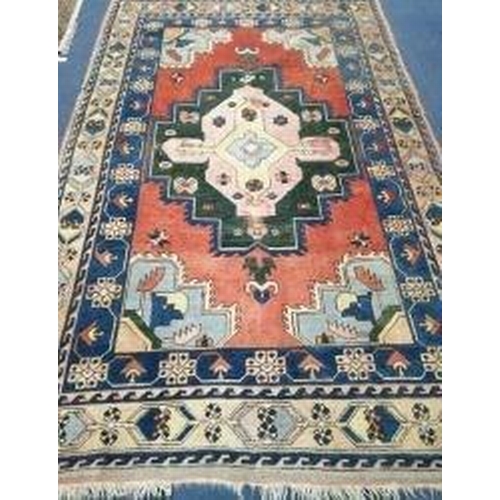 873 - A Caucasian Kazak geometric rug, 295 x 175cm Condition: Possibly a little faded with patches of wear... 