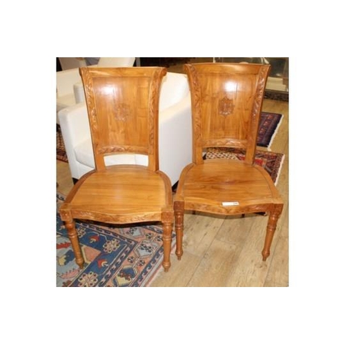 875 - A pair of Asian hardwood hall chairs, with foliate carved frames, W.57cm D.52cm H.115cm Condition: B... 