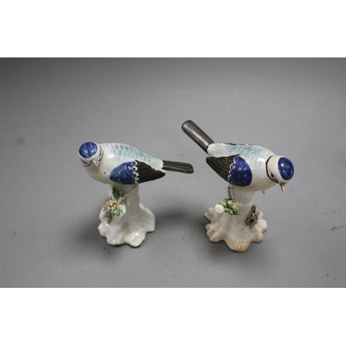 95 - A pair of Derby figures of blue tits on tree stumps, c.1765-70, height 11.7cm and 11.5cm Note: Ex Ch... 