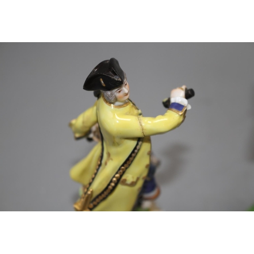 96 - A 19th century Meissen figure of a huntsman and a 19th century English porcelain monkey band figure,... 