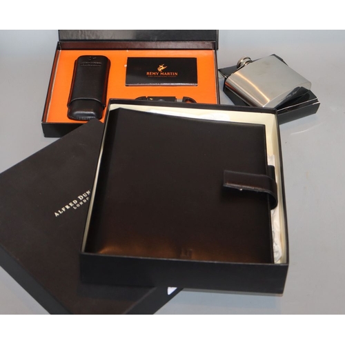 317 - A Dunhill filofax, a Remy Martin cigar set and hip flask