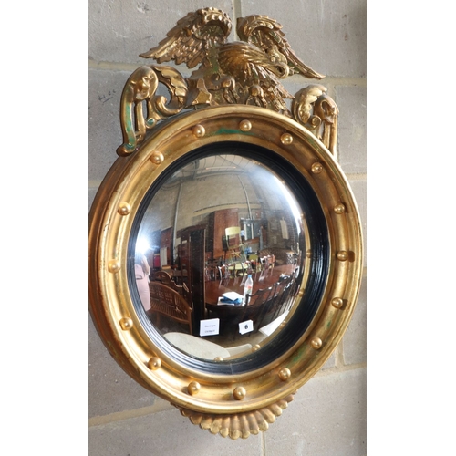 1006 - A Regency giltwood and gesso convex wall mirror, 63cm diameter, H.87cm