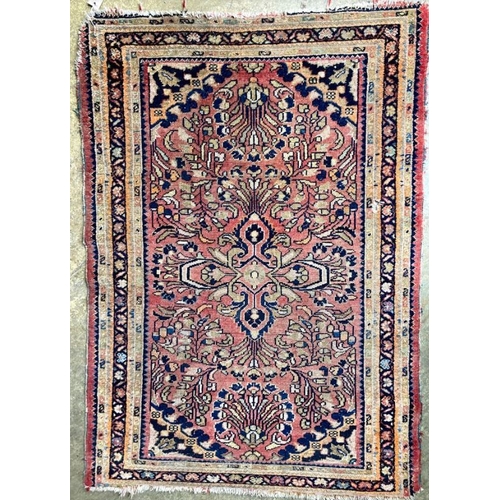 1008 - A North West Persian red ground rug, 140 x 98cm