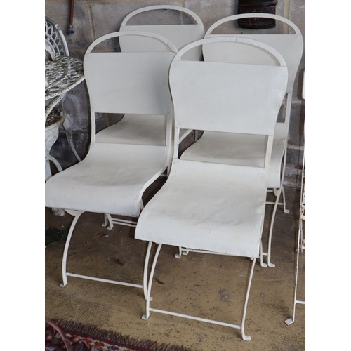 1013 - A set of four painted metal garden chairs