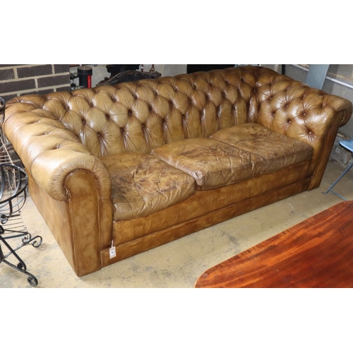 1021 - A pale brown leather buttoned Tetrad Chesterfield settee, W.205cm, D.94cm, H.70cm