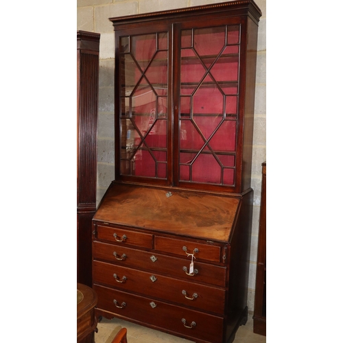 1028 - A George III mahogany bureau bookcase, W.108cm, D.54cm, H.230cm
