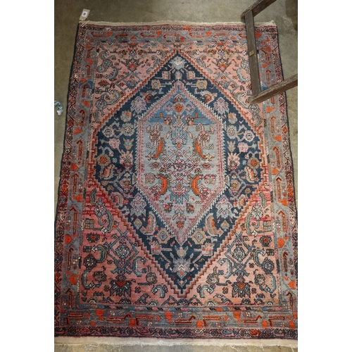 1052 - A Sarouk rug, 146 x 104cm