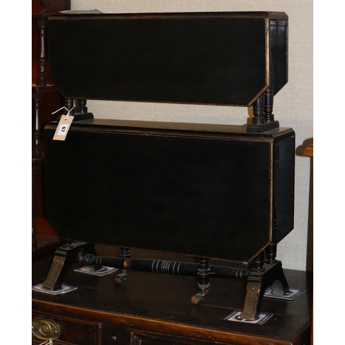 1067 - A late Victorian aesthetic movement galleried ebonised two tiered Sutherland table, W.60cm, D.25cm, ... 