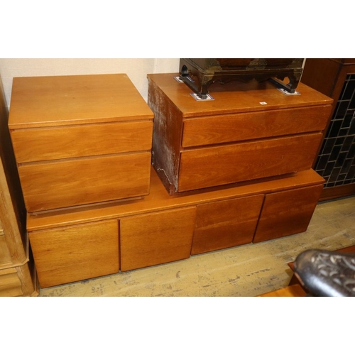 1072 - A mid century design teak low cabinet, W.168cm, D.53cm, H.50cm and two two drawer chests