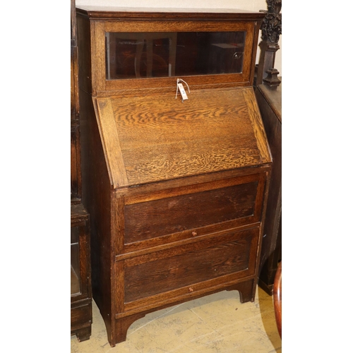 1075 - A Globe Wernicke style oak bureau bookcase, W.79cm, D.42cm, H.138cm