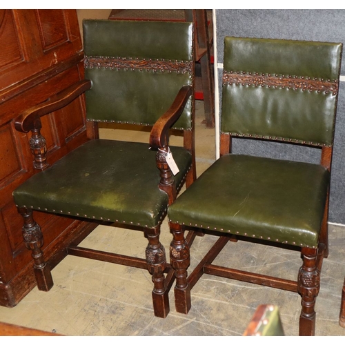 1087A - A set of six 1920's Jacobean revival carved oak dining chairs (two with arms)