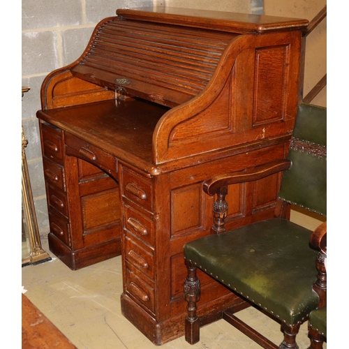1088 - An early 20th century oak roll top desk with 'S' shaped tambour, W.106cm, D.76cm, H.125cm