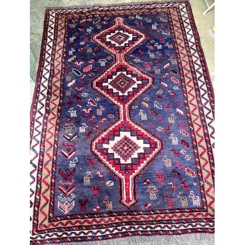 1092 - A Qashqai blue ground carpet, 240 x 160cm
