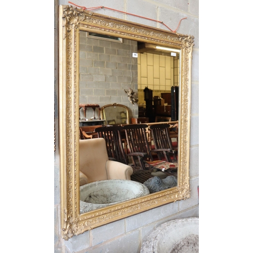 1093 - A Victorian rectangular giltwood and gesso wall mirror, 90cm x 110cm